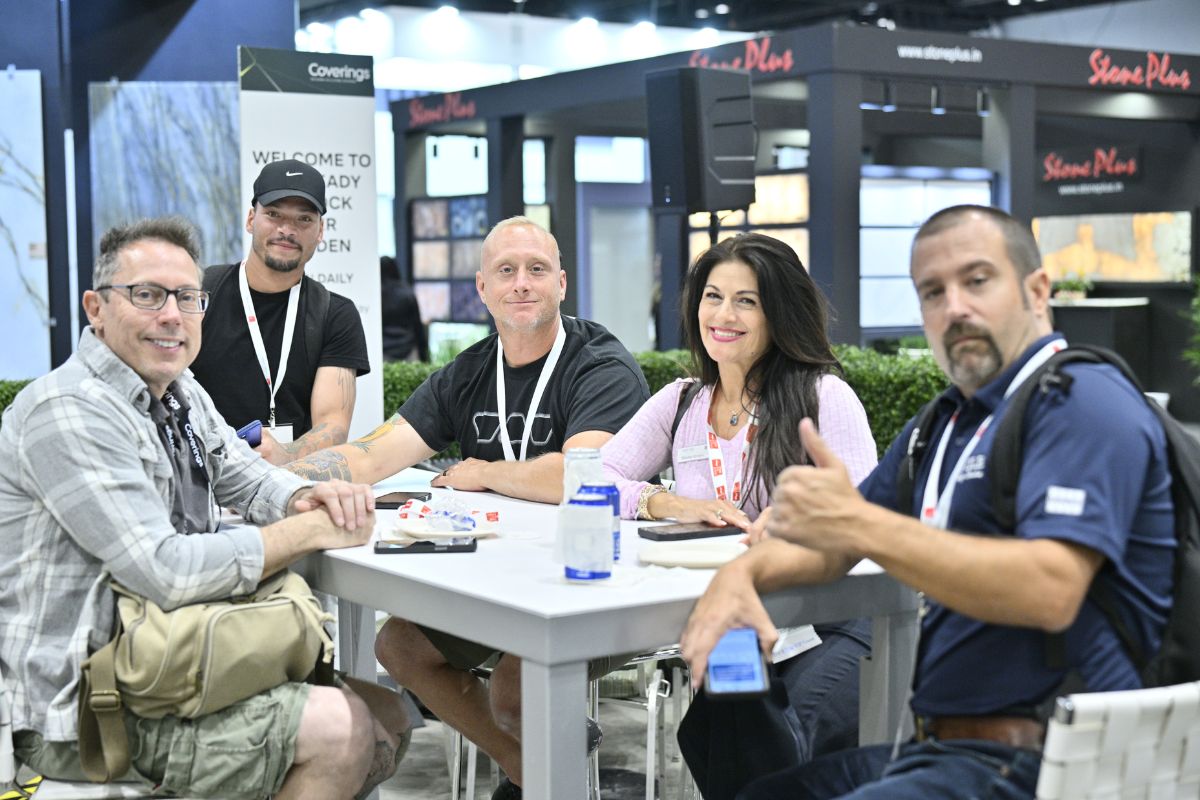 Coverings attendees connecting and discussing opportunities at the show